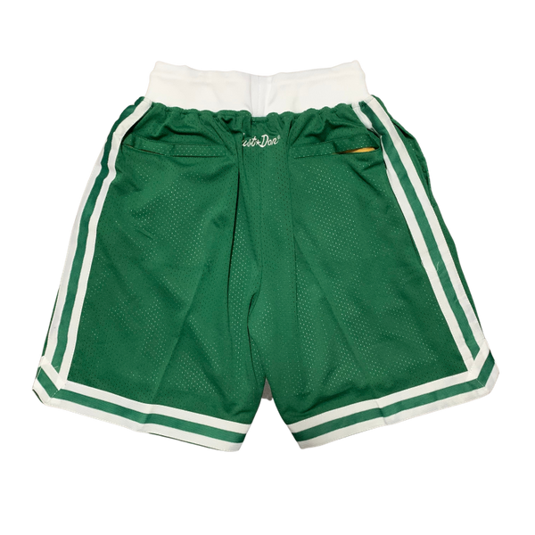 Retro NBA basketball shorts with bold team logos and vintage design, featuring elastic waistbands and detailed stitching