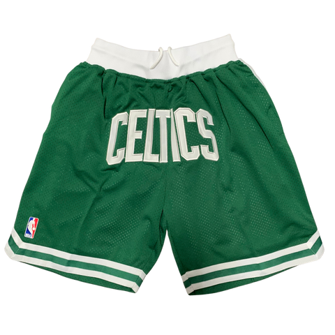 Retro NBA basketball shorts with bold team logos and vintage design, featuring elastic waistbands and detailed stitching